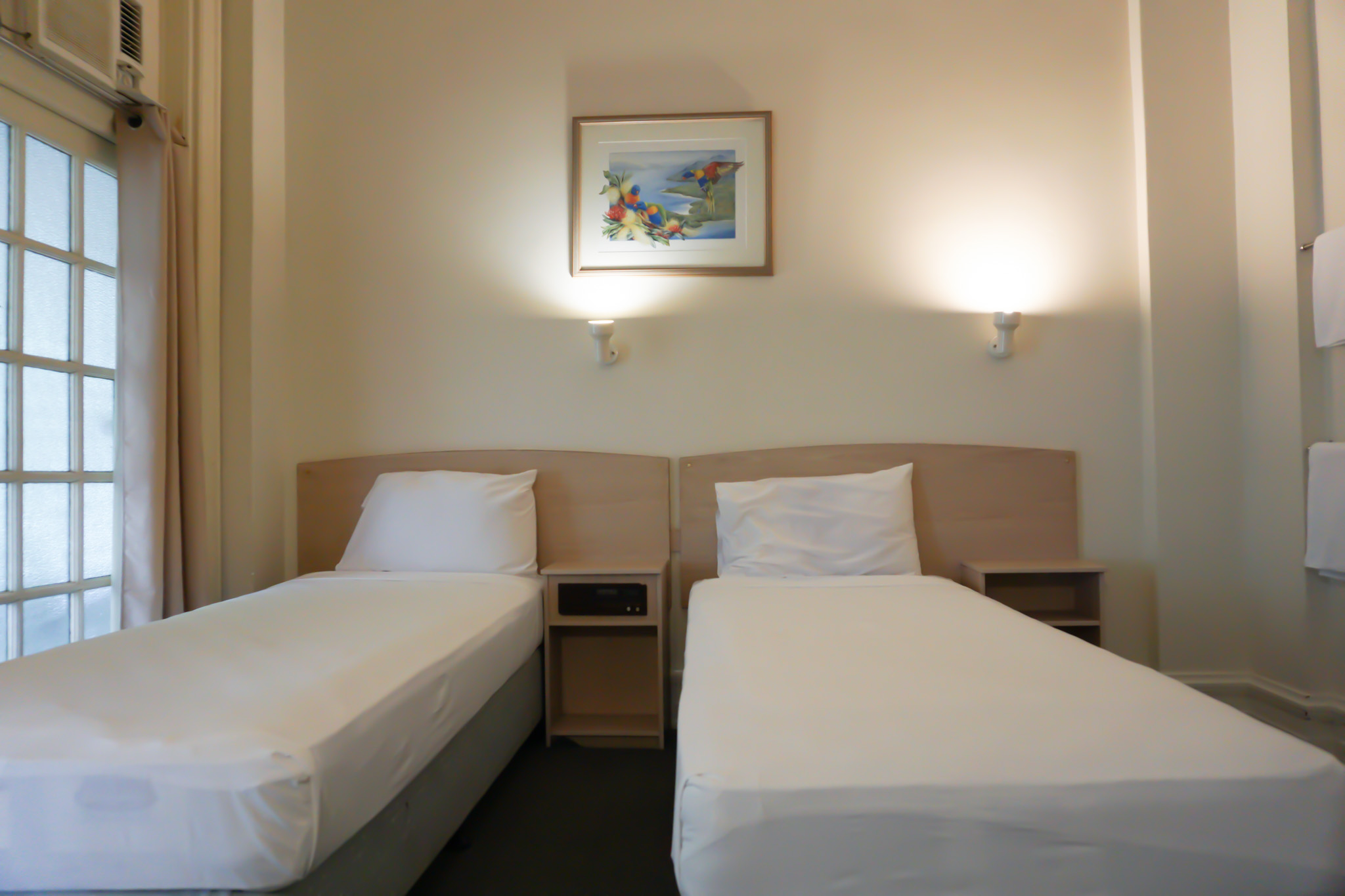 Heritage budget twin room at Hides Hotel Cairns with two single beds